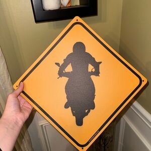 Motorcycle Rider Caution Sign